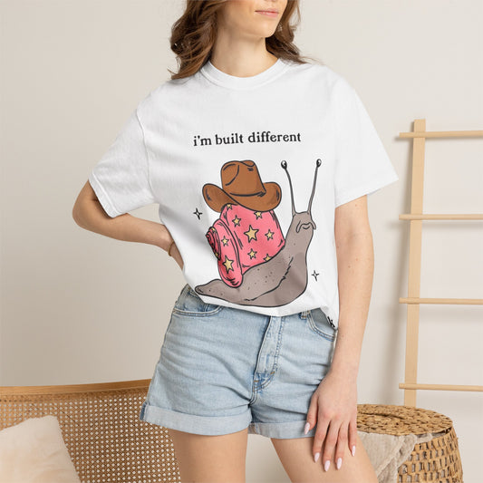 Snail Graphic T-Shirt — "i'm built different like incorrectly i think" Cute Cowpoke Shell Tee